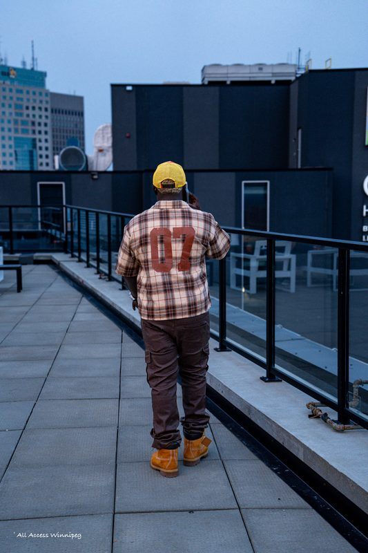 Branding apparel shot, walking the rooftop terrace at dusk, Konfam shoot, Winnipeg