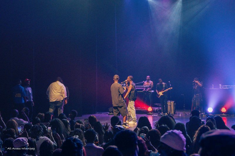 Wide stage shot with full band, P0PS x Young Jonn, Winnipeg