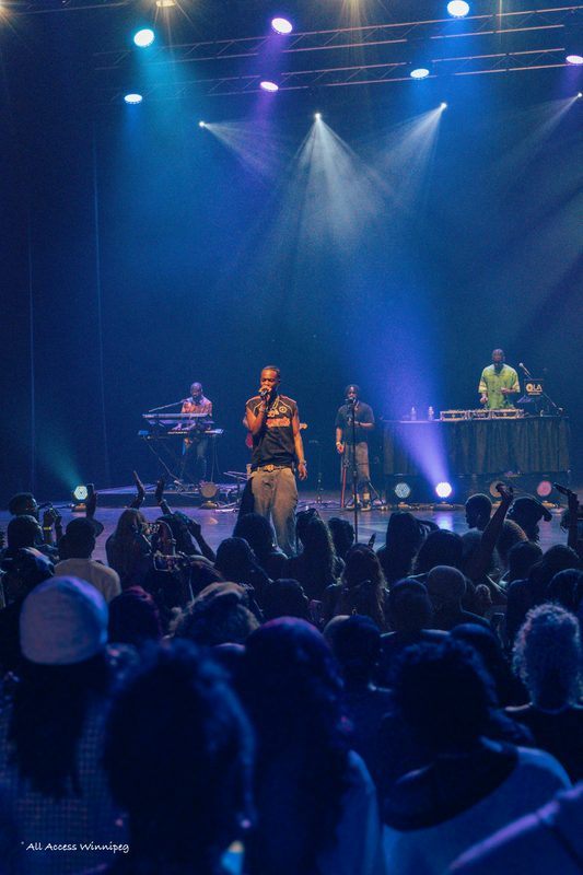 Stage shot with band and cheering crowd, P0PS x Young Jonn, Winnipeg