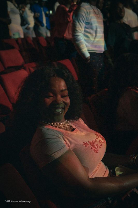 Fan smiling in the crowd, P0PS x Young Jonn, Winnipeg