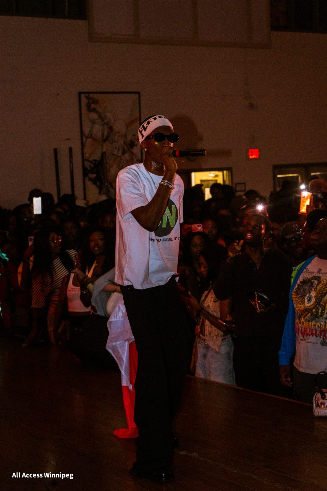 MAVO on stage with mic, City Oasis Hall, Winnipeg