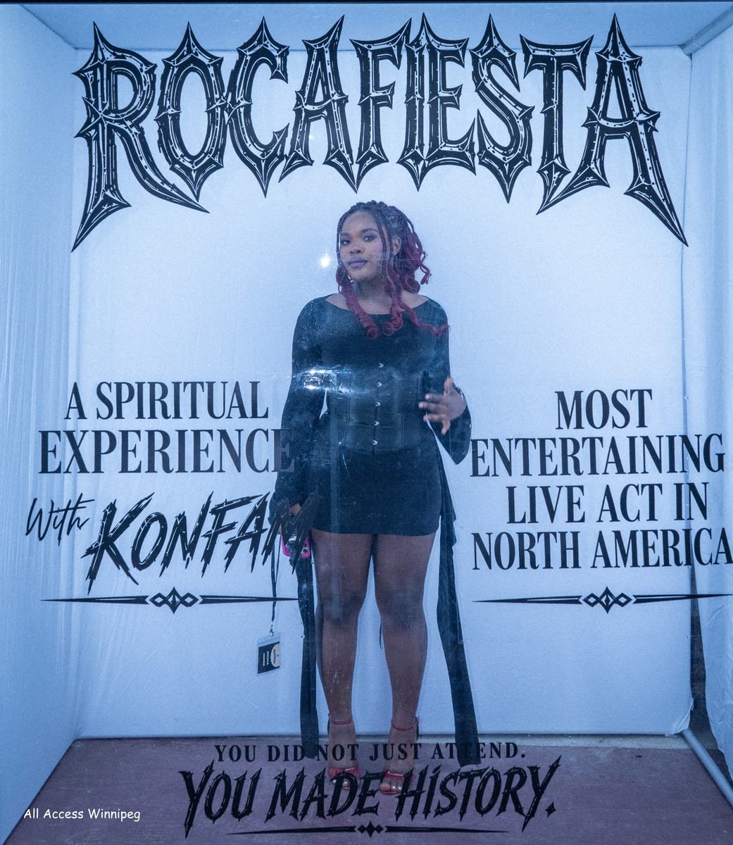 Guest posed in front of the ROCAFIESTA step-and-repeat