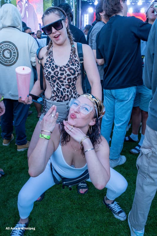 Two guests posed together on the festival grounds
