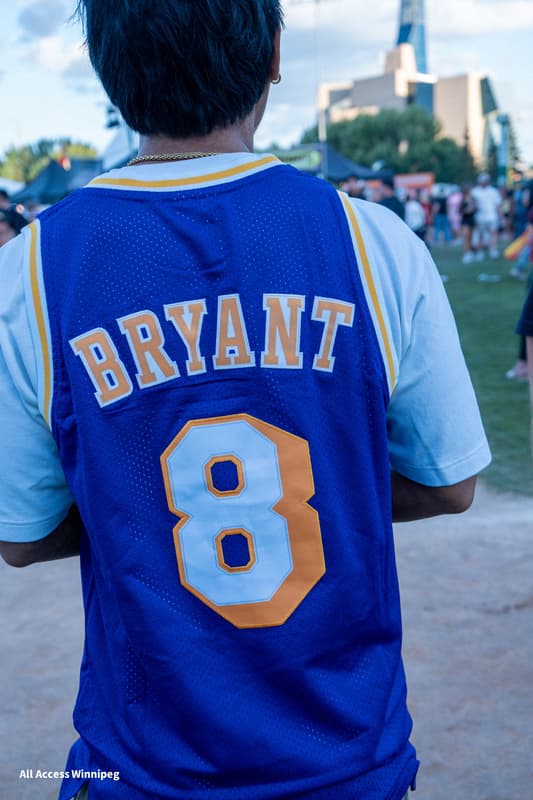 Guest in a Kobe Bryant jersey among the festival crowd